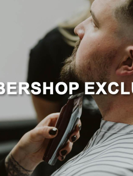 Vanessa Hermann beim Bartstyling mit Klipper an einem Mann, dunkle Haare der Friseurin, Barbershop Exclusive Seminar, Deutsche Friseurakademie, Bartpflege-Details, professionelle Tools